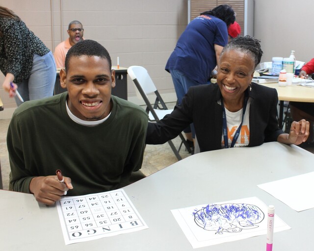 Ryan and volunteer playing bingo